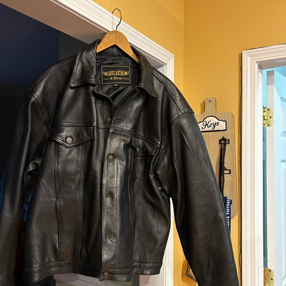 Selling black  Unik , Ultra genuine leather jacket .